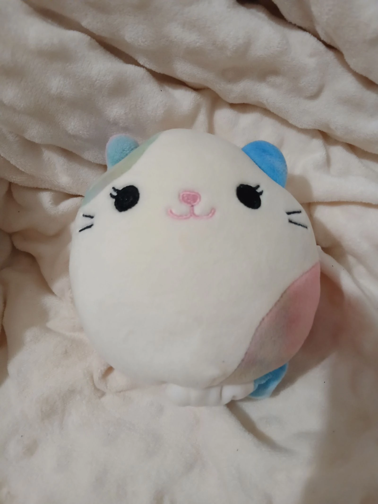 Petite peluche squishmallow réversible 